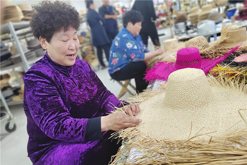 Traditional straw hats embrace fashion and global markets